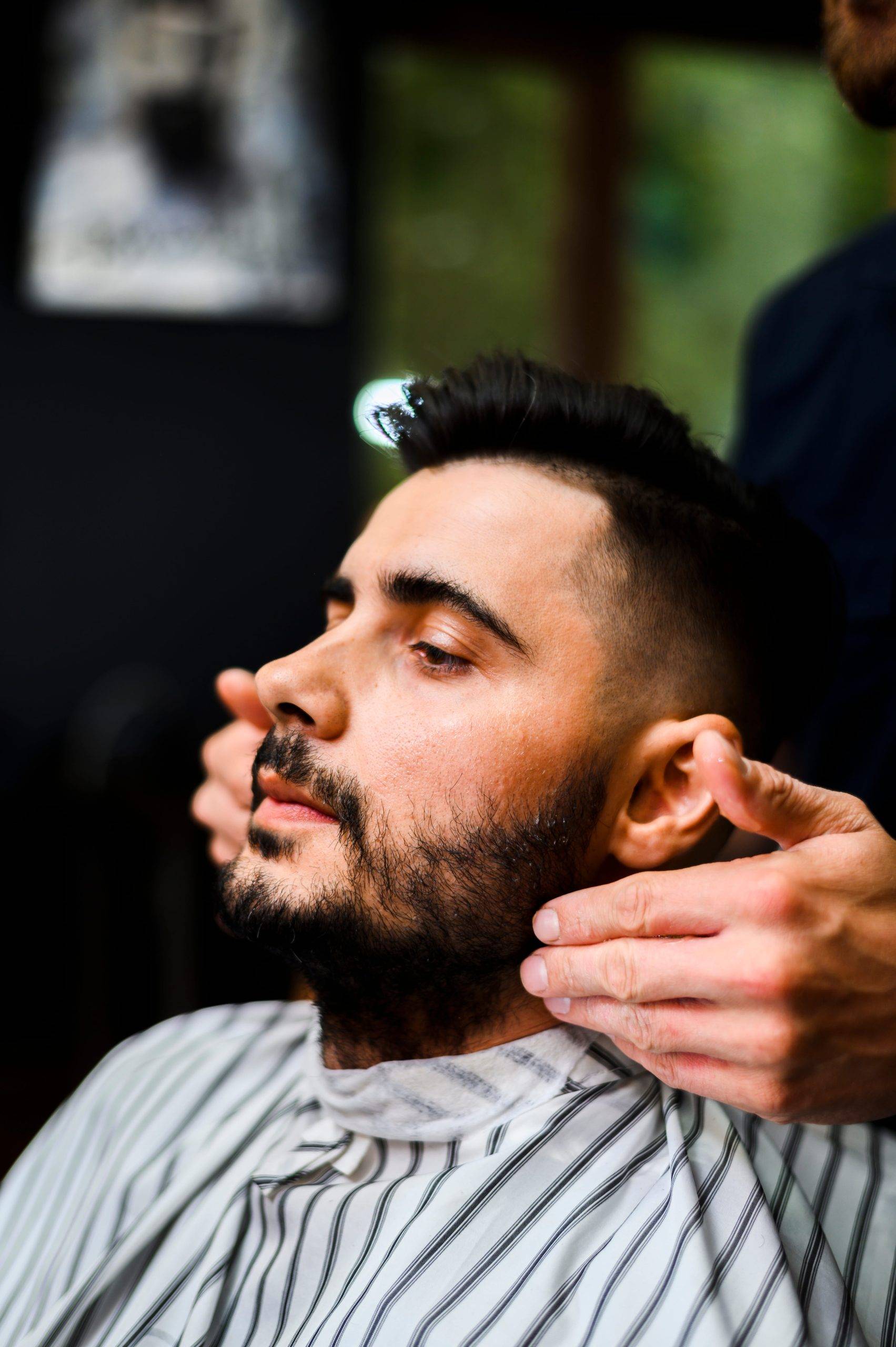 A man having facial massage in a salon