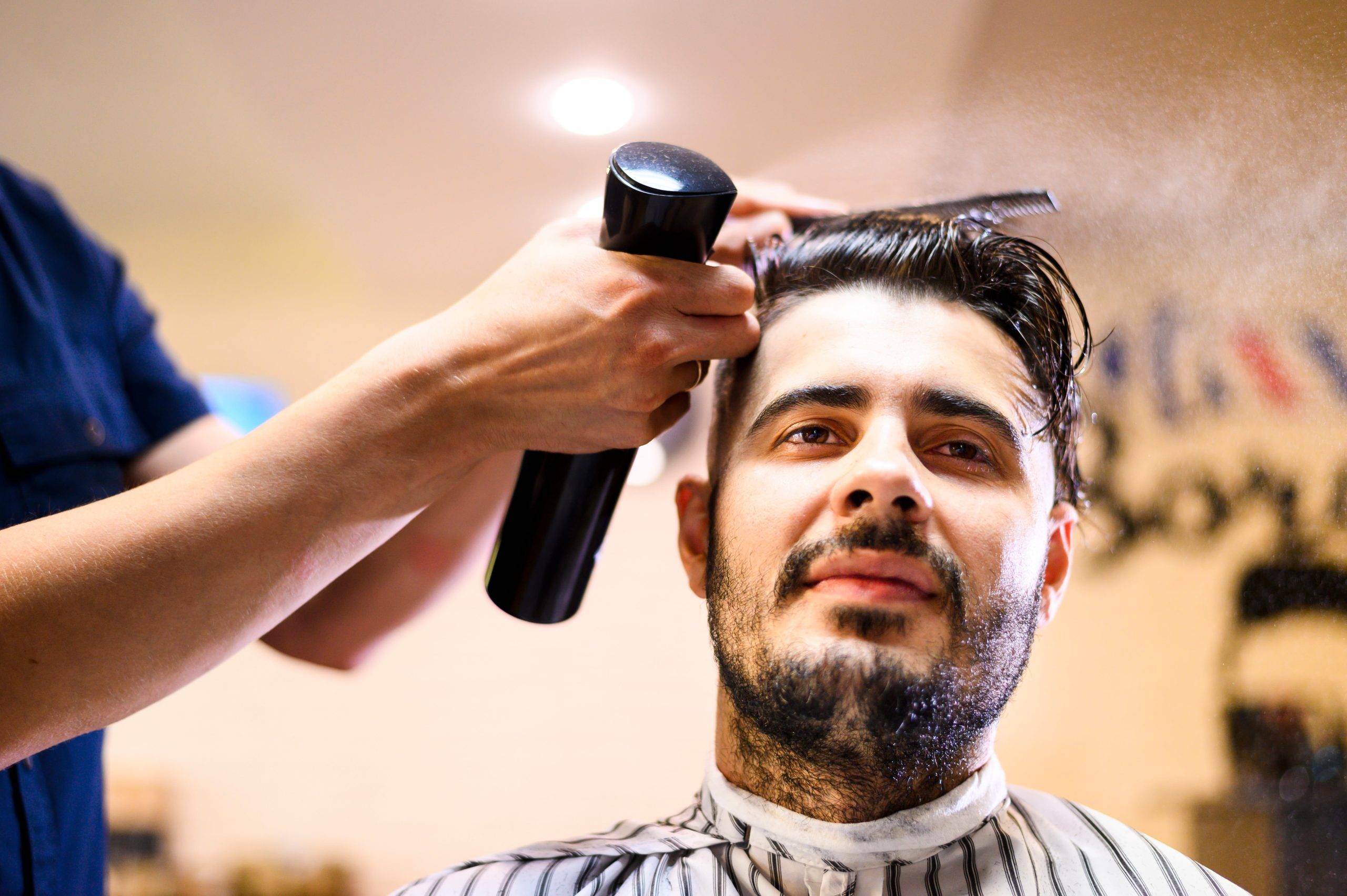 A man having haircut in salon